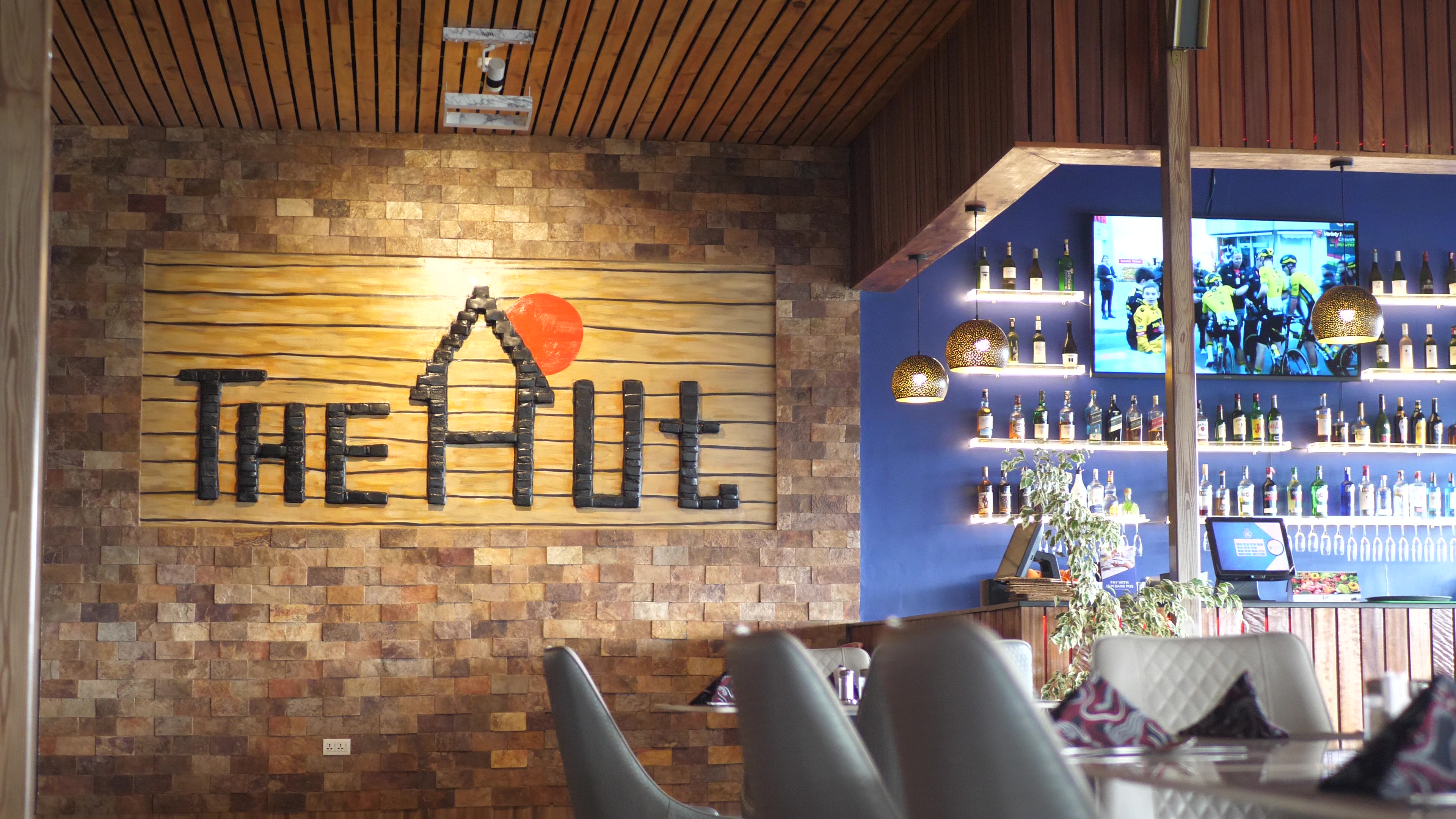 Enjoy a fine dining experience at The Hut Hotel, known for its exceptional food and ambiance in hotels in Kigali.