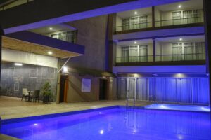 Night view of Swimming pool at The Hut, one of the finest Rwanda Luxury Lodges