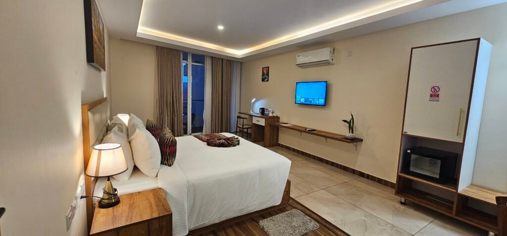 Elegant suite at The Hut, offering the best room in Kigali for luxury travelers.
