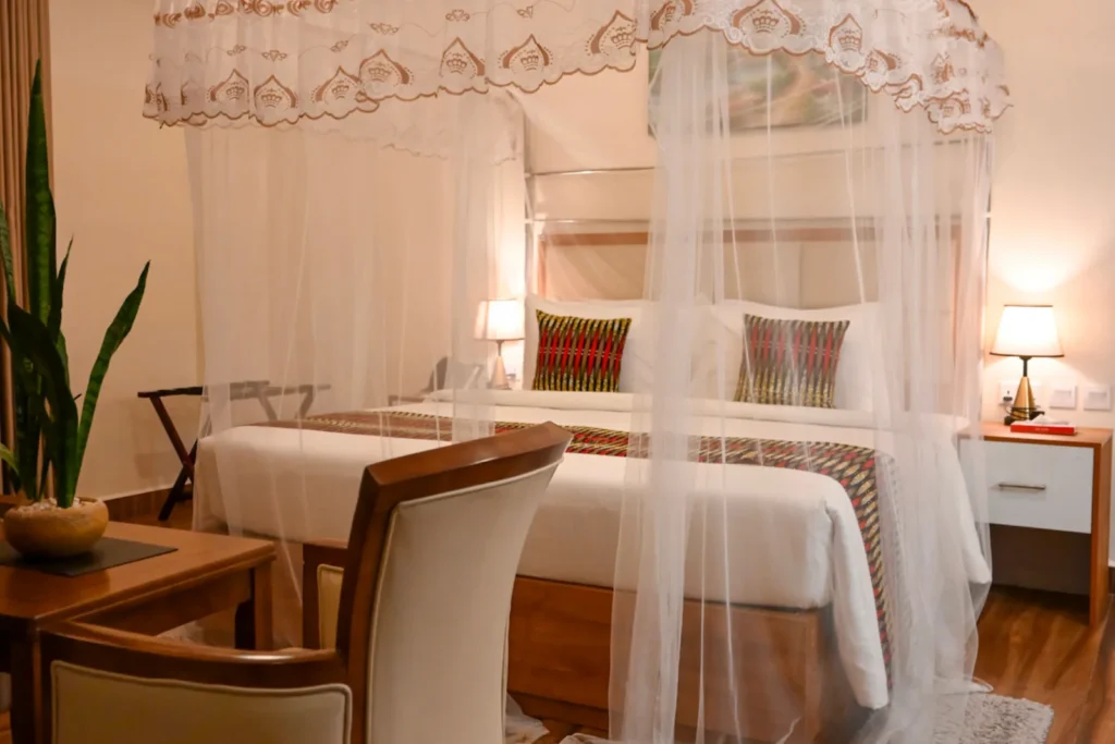 Junior Suite bedroom at The Hut Hotel, Kigali